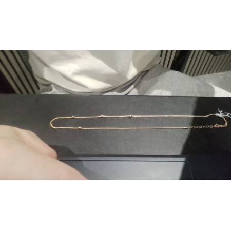 Cadena fina con bolitas de oro 18k