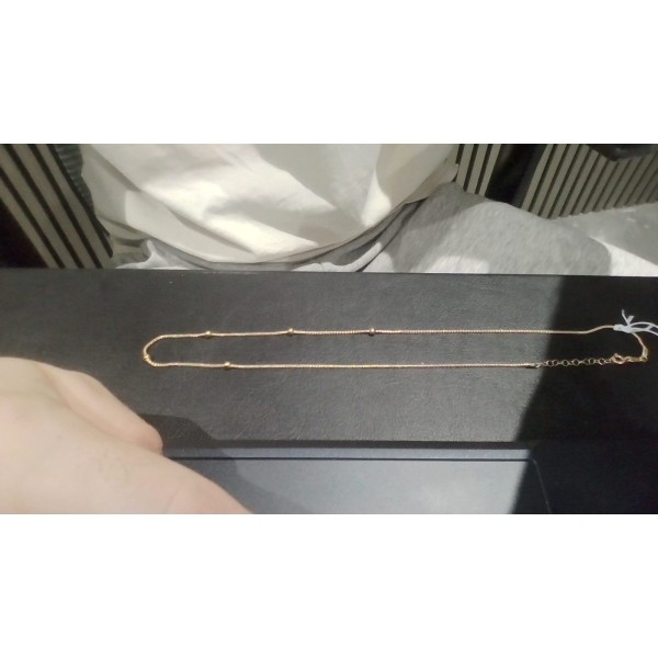 Cadena fina con bolitas de oro 18k